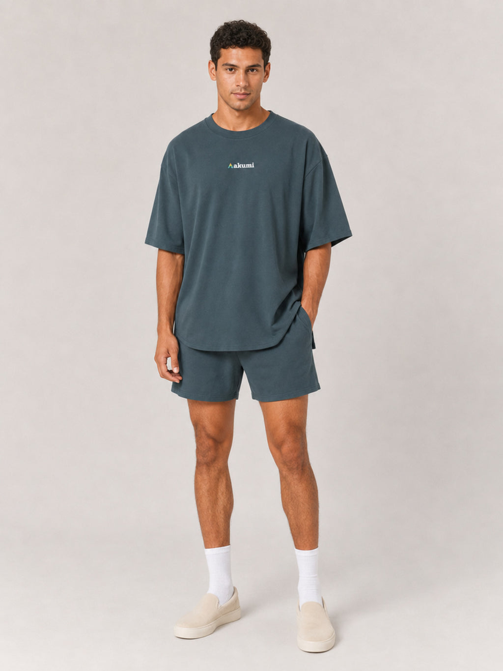 Akumi Stillday Lounge Tee in Juniper Smoke, male full-body front studio view