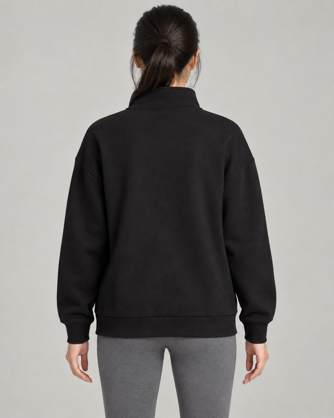 AI-generated design concept: Stillform Half-Zip Sweatshirt in Onyx, back view.