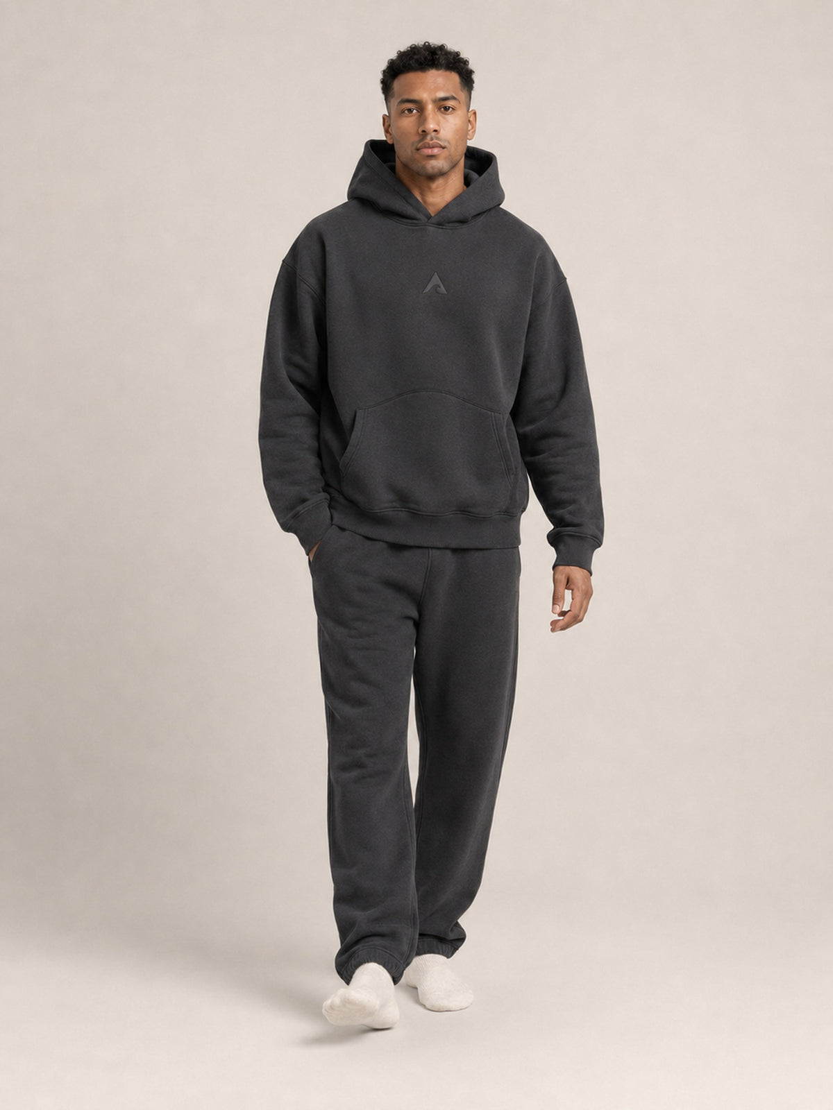 Charcoal##Akumi Stillform Hoodie, walking