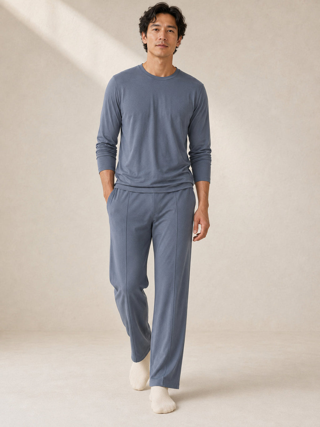 Akumi Stillform Lounge Pant in Night Mist, men’s full-body fit view