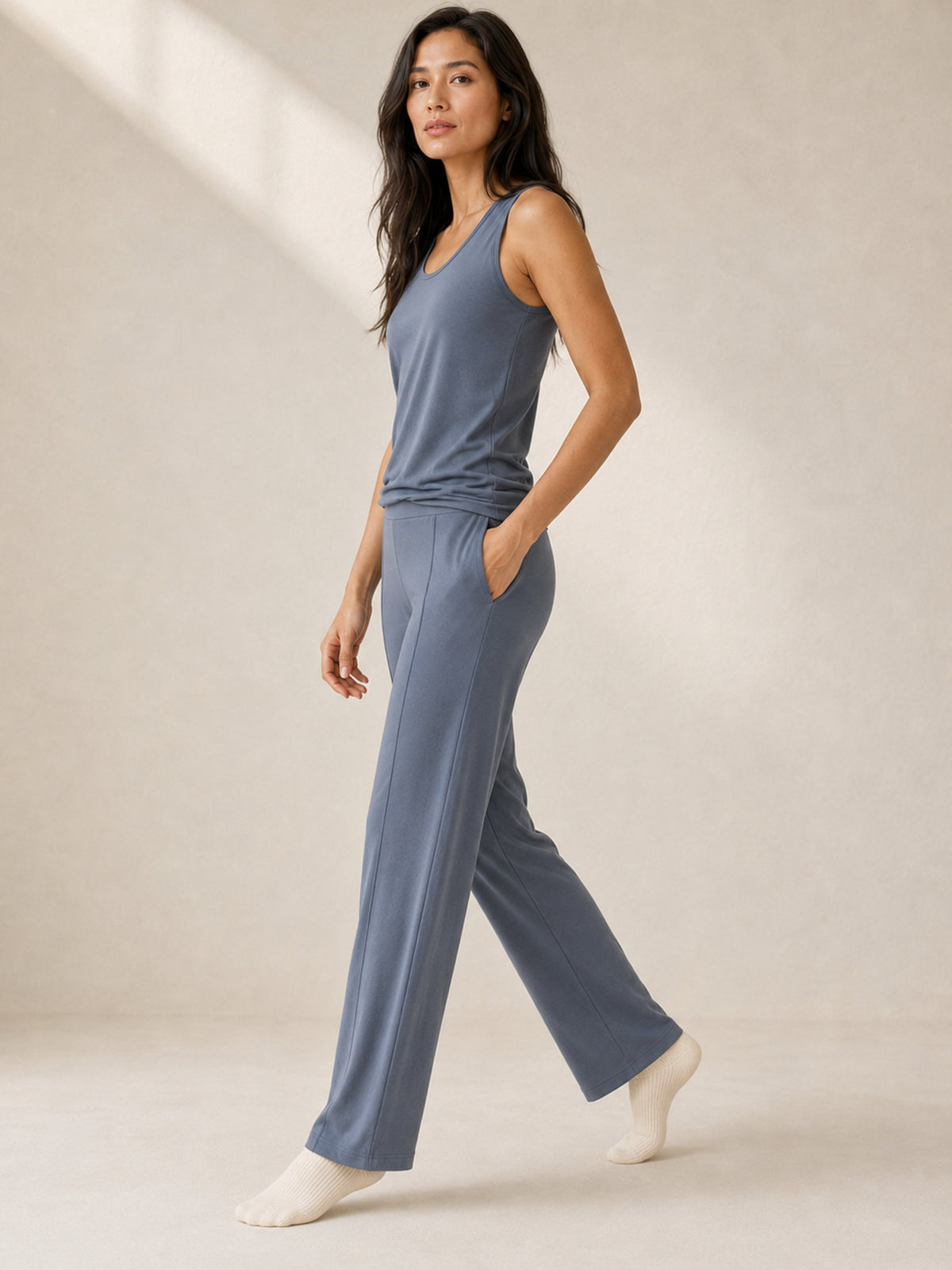 Akumi Stillform Lounge Pant in Night Mist, women’s side movement view