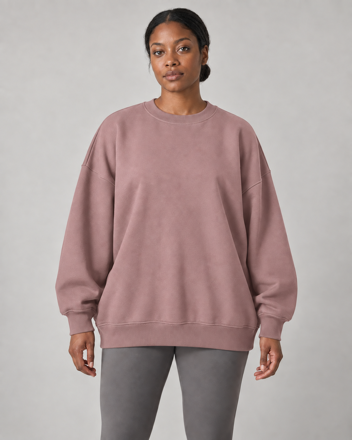 AI-generated design concept: Stillform Oversized Crew in Dusty Rose, front view.