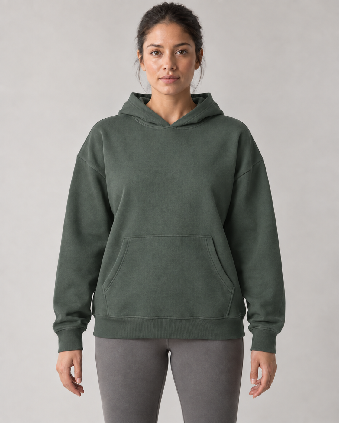 AI-generated design concept: Stillform Relaxed Pullover Hoodie in Juniper, front view.
