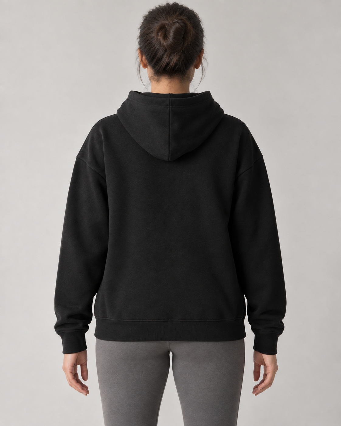 AI-generated design concept: Stillform Relaxed Pullover Hoodie in Onyx, back view.