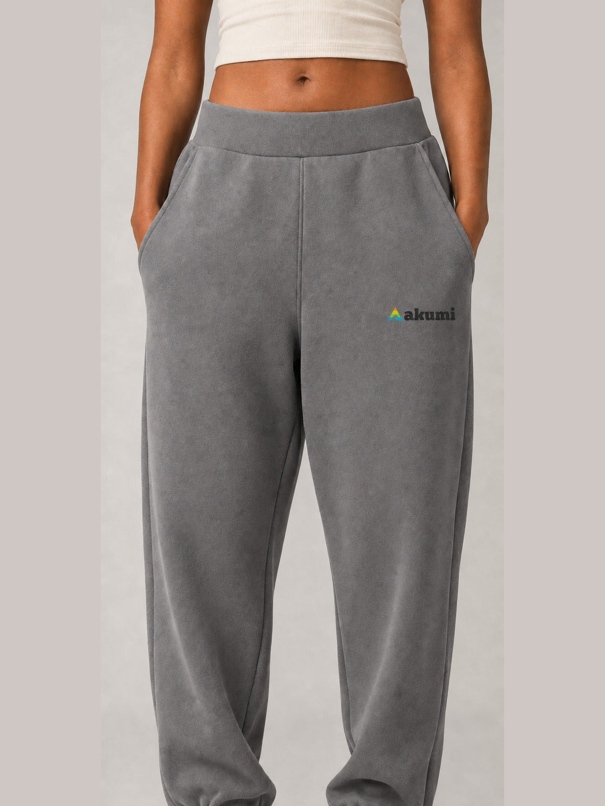 Akumi Stillform Sweatpant in Mineral Grey with full Akumi logo, waistband and pocket detail