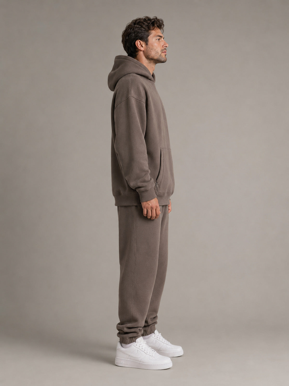Akumi Stowline Utility Hoodie in Cedar Smoke, side profile view
