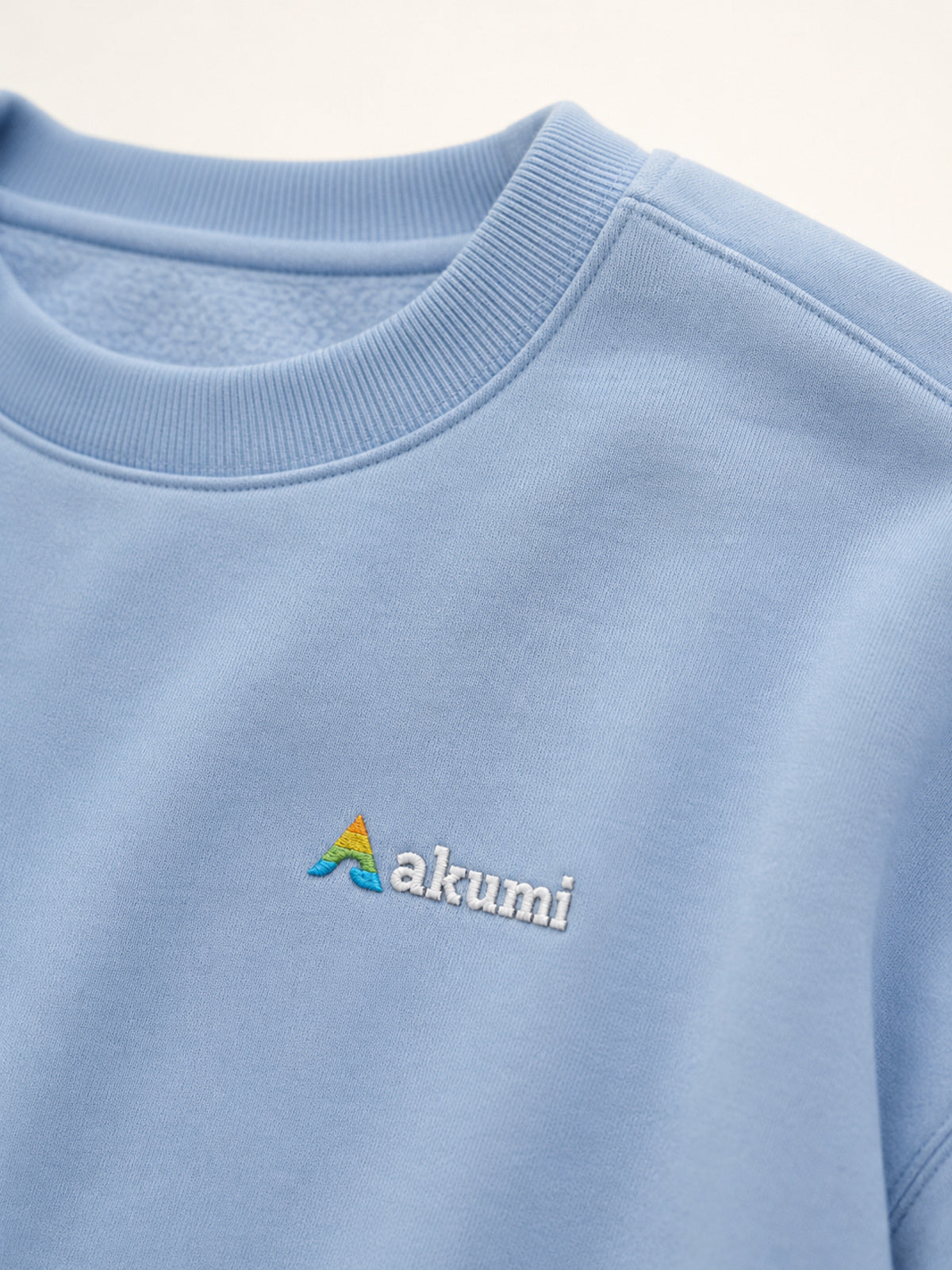 Akumi Studyline Lightweight Crew in Cove Blue, embroidered logo and rib collar detail