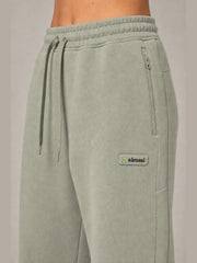 Akumi Transitline Straight-Leg Travel Sweatpant in Sage Fog, cleaned Akumi logo and zip pocket detail