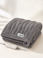 Akumi Warmline Blanket folded with controller and full-color Akumi woven label