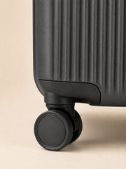 Akumi Wayline Carry-On Luggage Drift Graphite spinner wheel detail