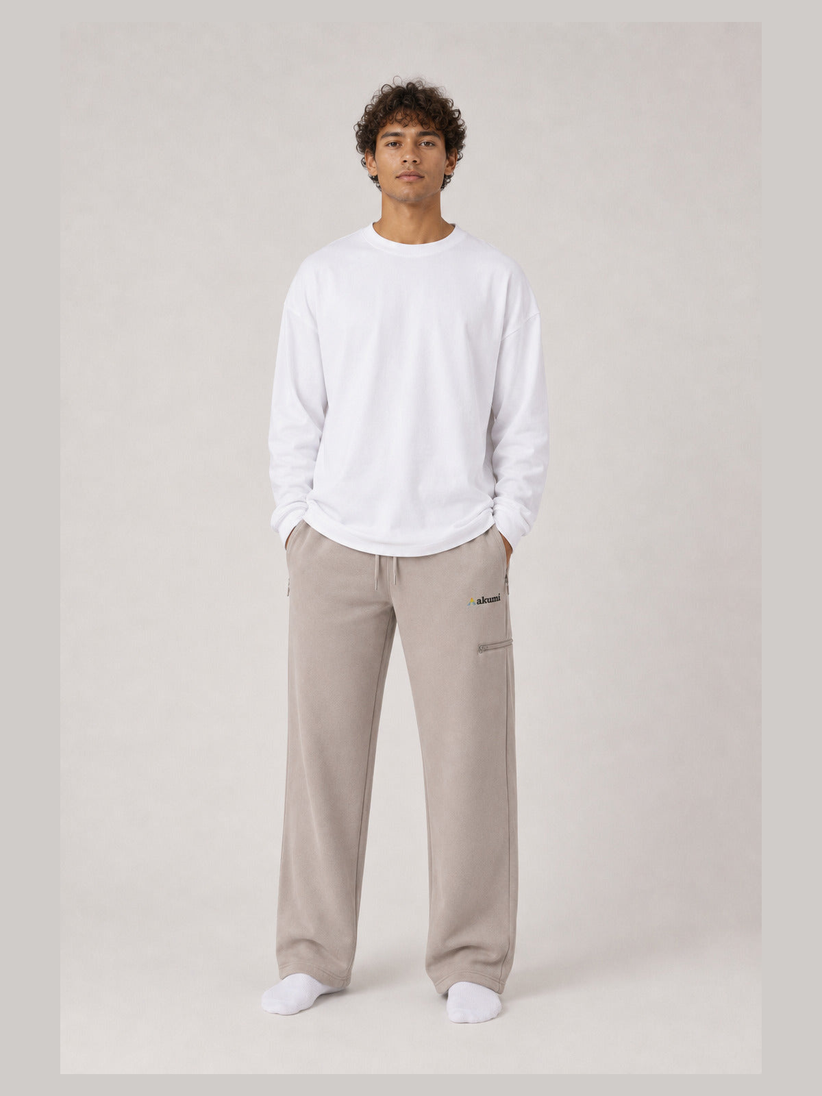 Akumi Waypoint Lightweight Straight-Leg Sweatpant in Canyon Fog, unisex male front studio view
