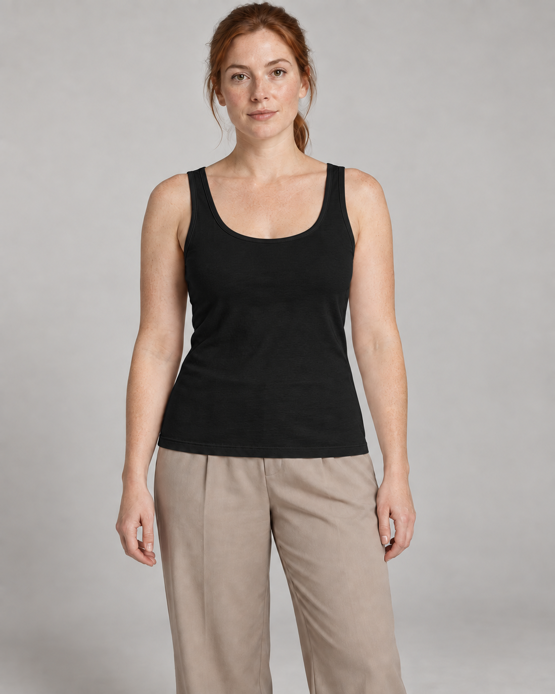 Akumi Balance Scoop Tank in Black, front studio concept view.