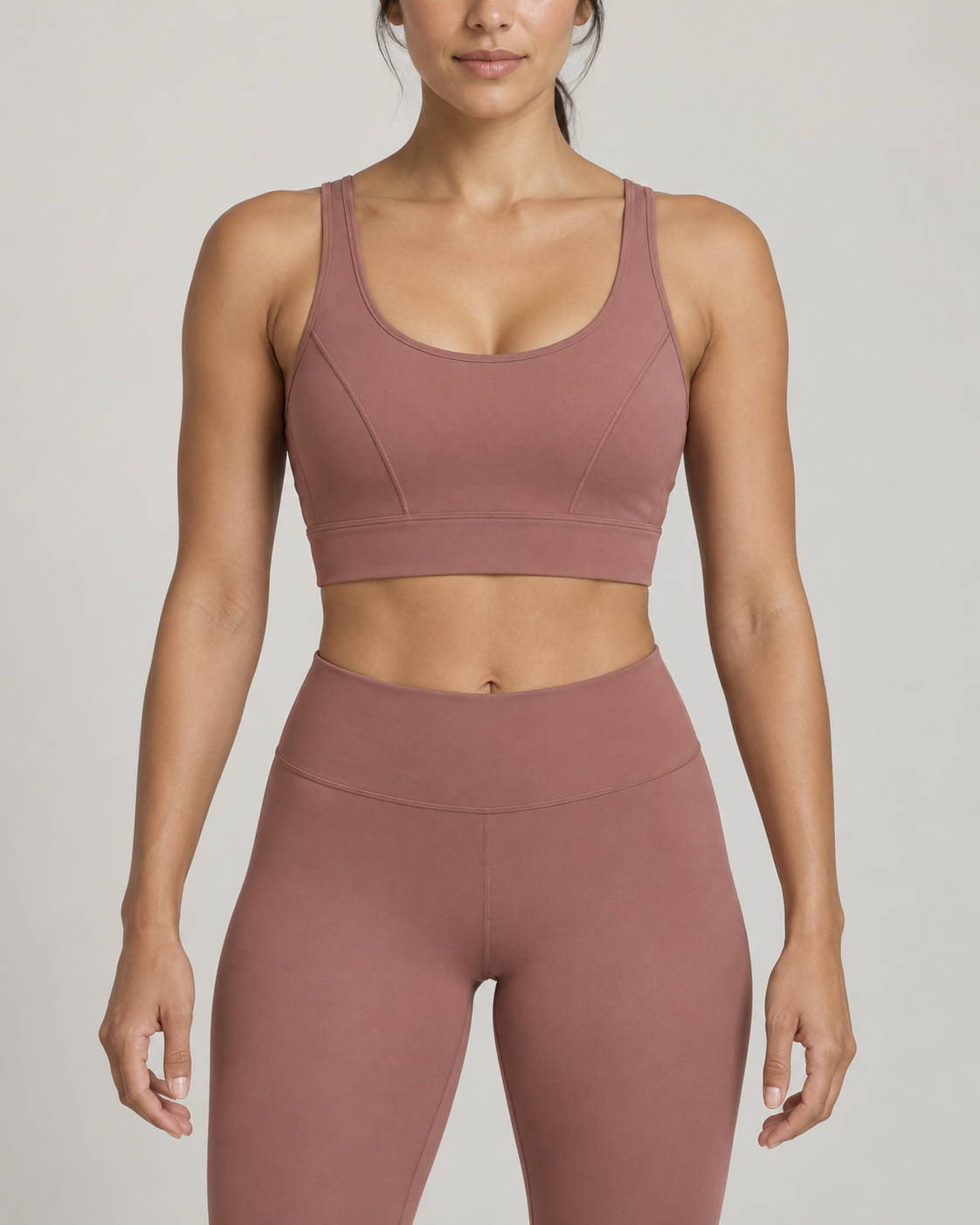 Design concept: Women's Orbit Seamed Sports Bra in Clay, front studio view