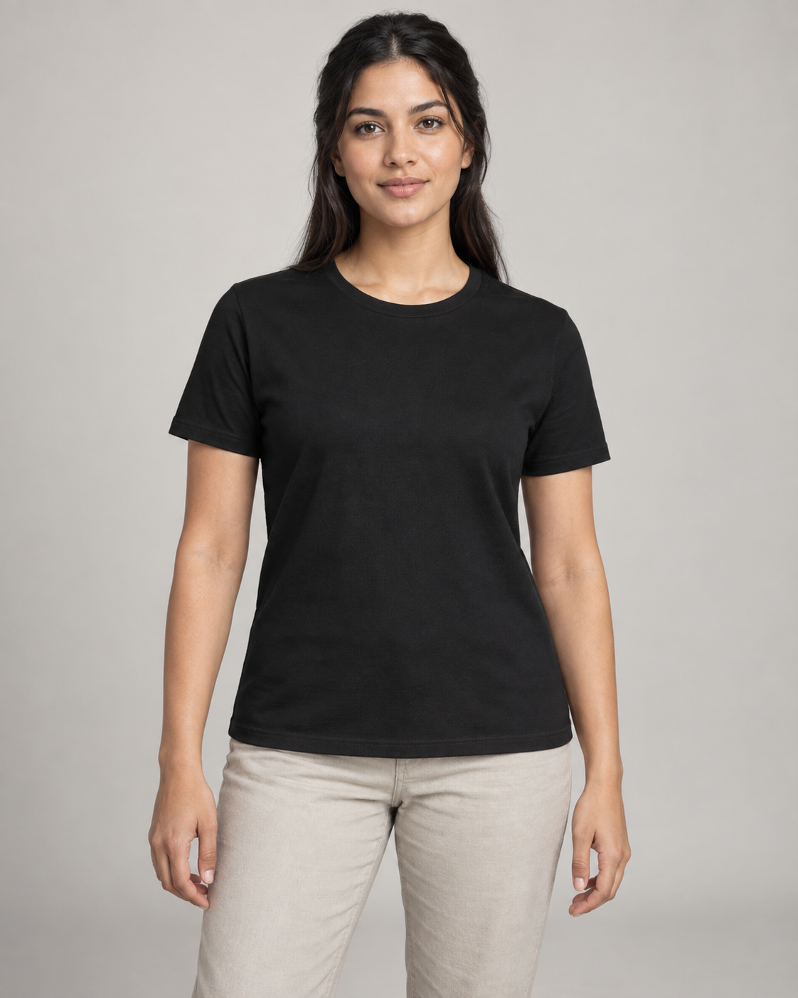 Generated concept mockup: women's Dayform Crew Tee in Black, front view on model.