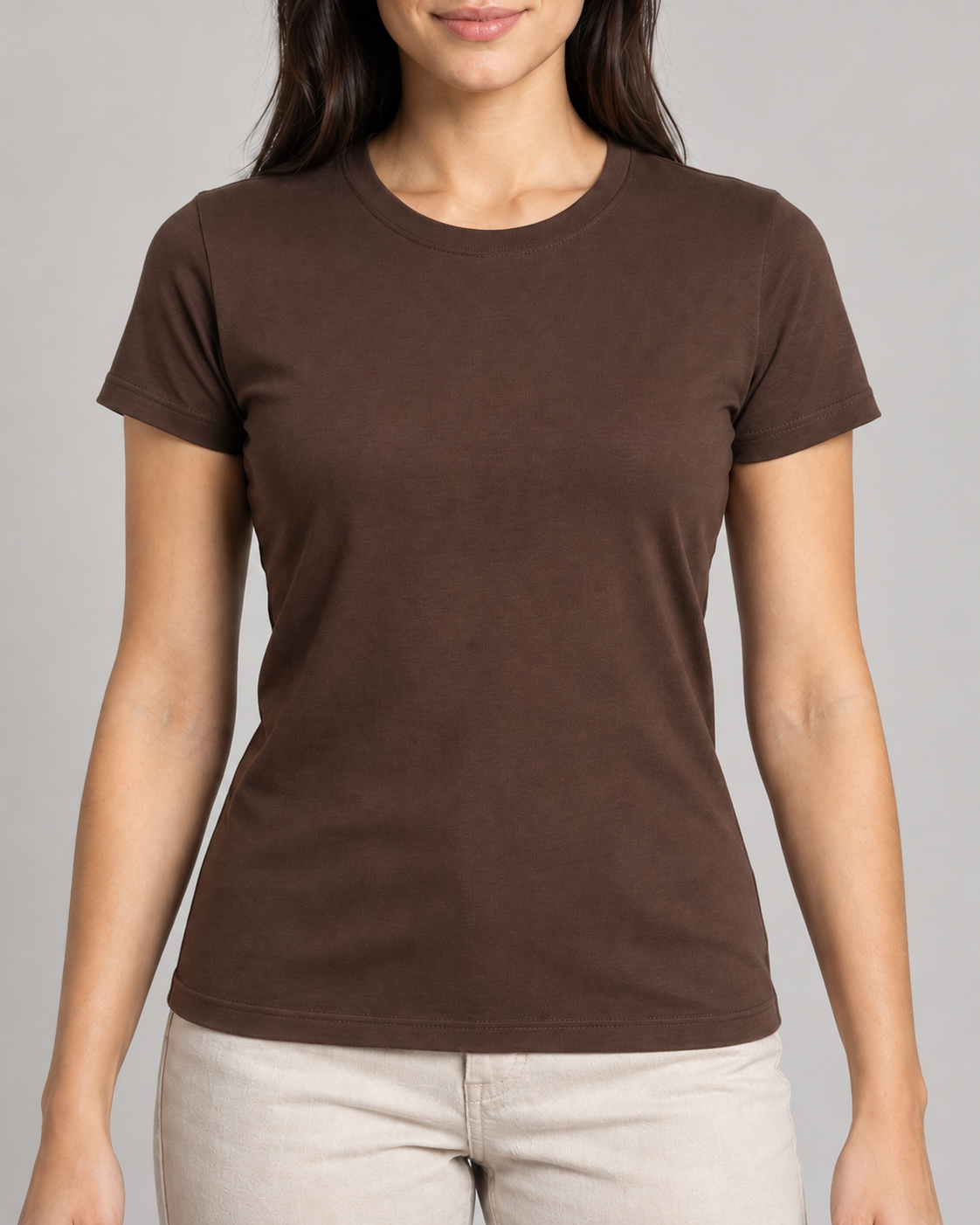 Generated concept mockup: Women's Outline Fitted Tee in Cocoa, construction detail view highlighting crew neckline, set-in sleeve seam and fitted waist shaping.