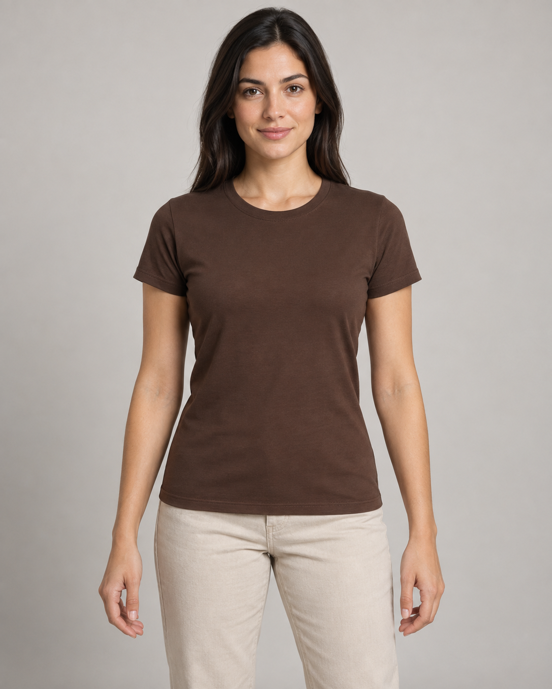 Generated concept mockup: women's Outline Fitted Tee in Cocoa, front view on model.