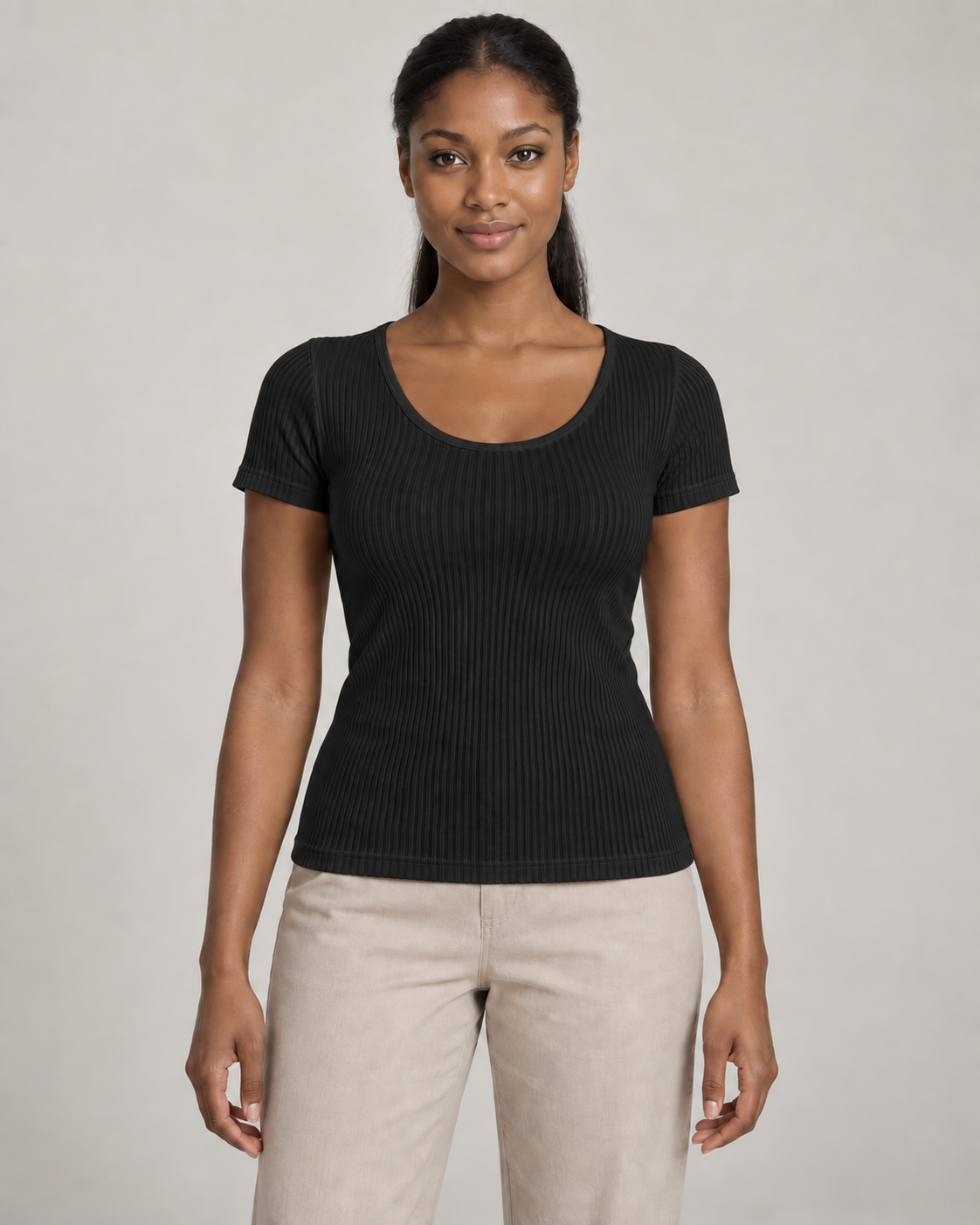 Generated concept mockup: Women's Outline Rib Tee in Black, front view on model.