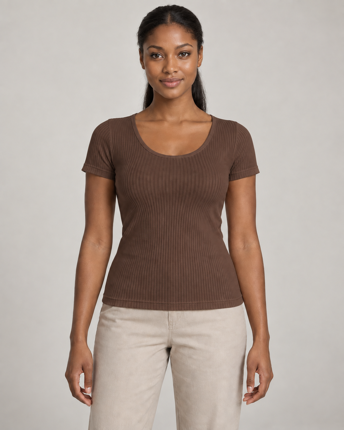 Generated concept mockup: Women's Outline Rib Tee in Cocoa, front view on model.