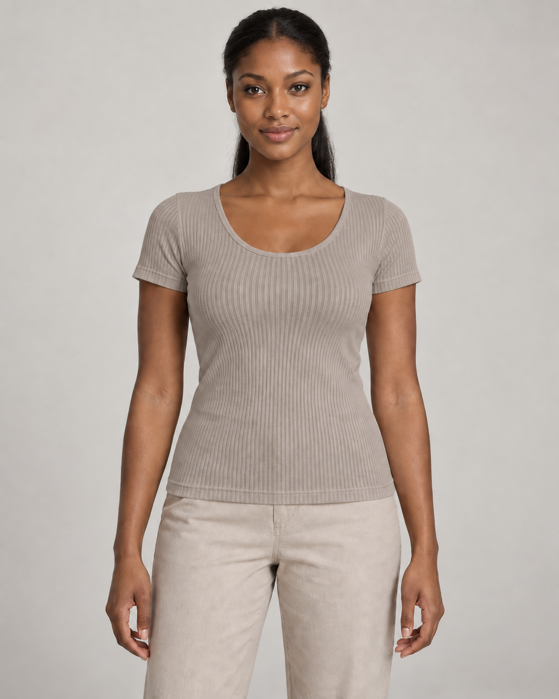 Generated concept mockup: Women's Outline Rib Tee in Stone, front view on model.