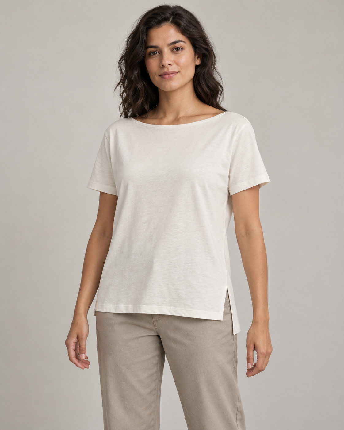 Generated concept mockup: women's Linea Split-Hem Tee in Chalk, front view on model.