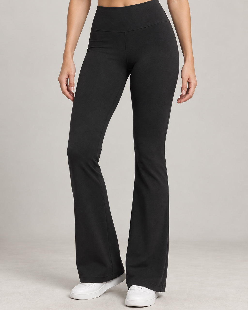 Generated concept: Akumi Arc Slim Flare Legging 31 inch in Black, front studio view