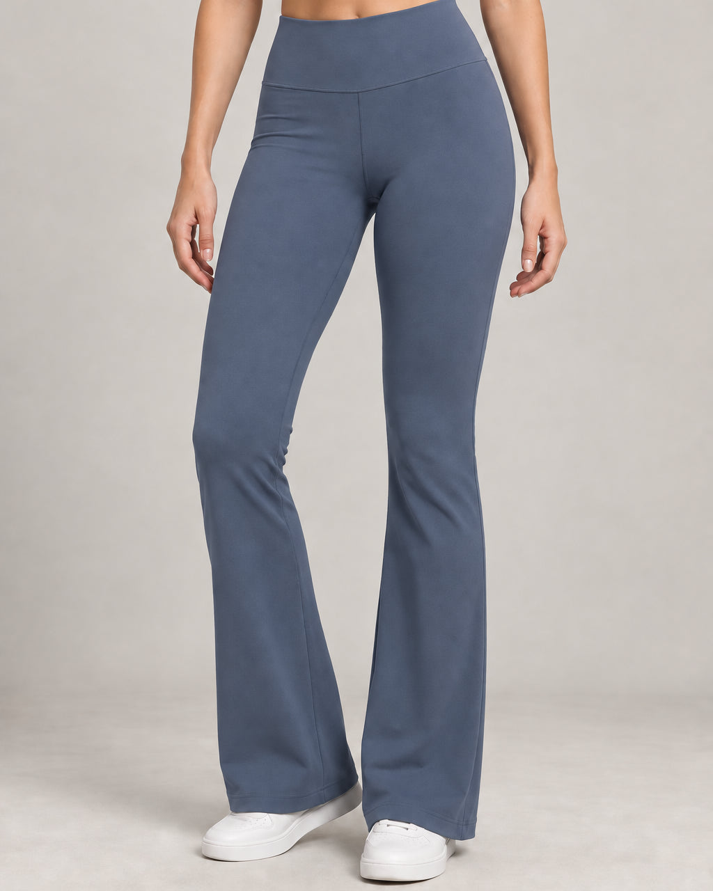 Generated concept: Akumi Arc Slim Flare Legging 31" in Slate Blue, front studio view
