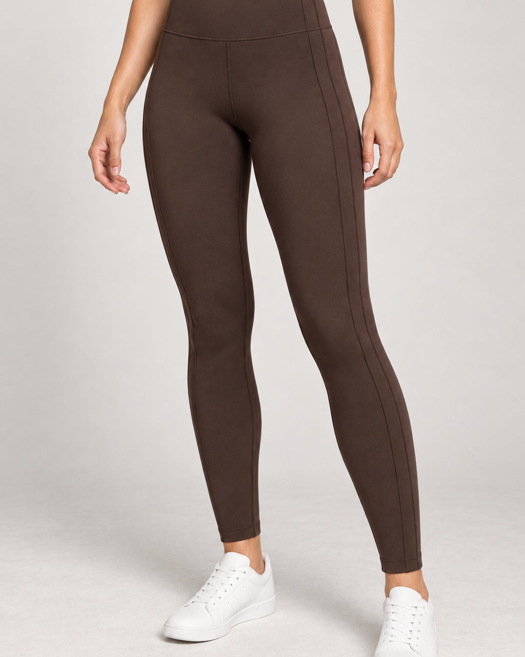 Generated concept: Akumi Contour Panel Legging 28 inch in Espresso, front studio view