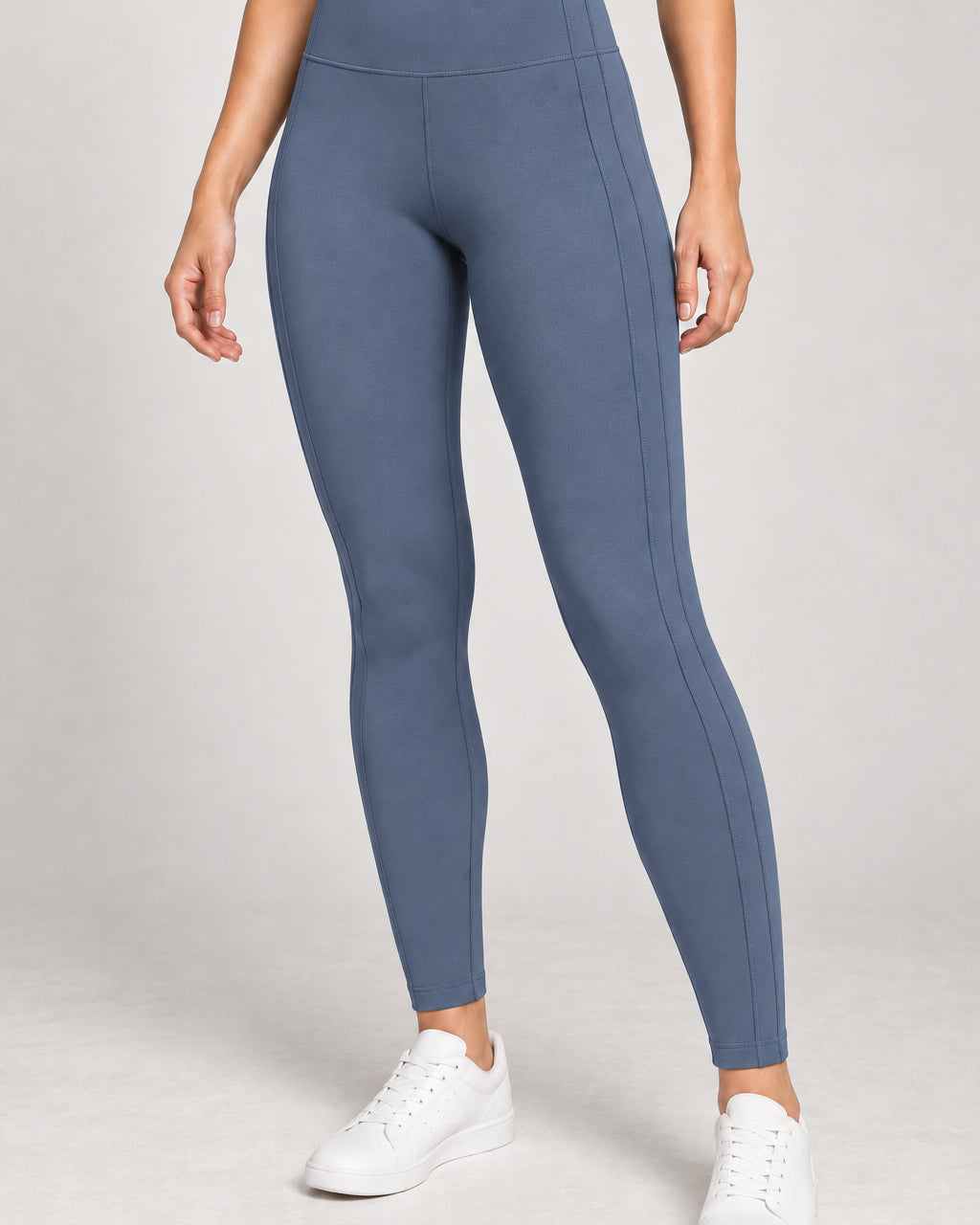 Generated concept: Akumi Contour Panel Legging 28" in Slate Blue, front studio view