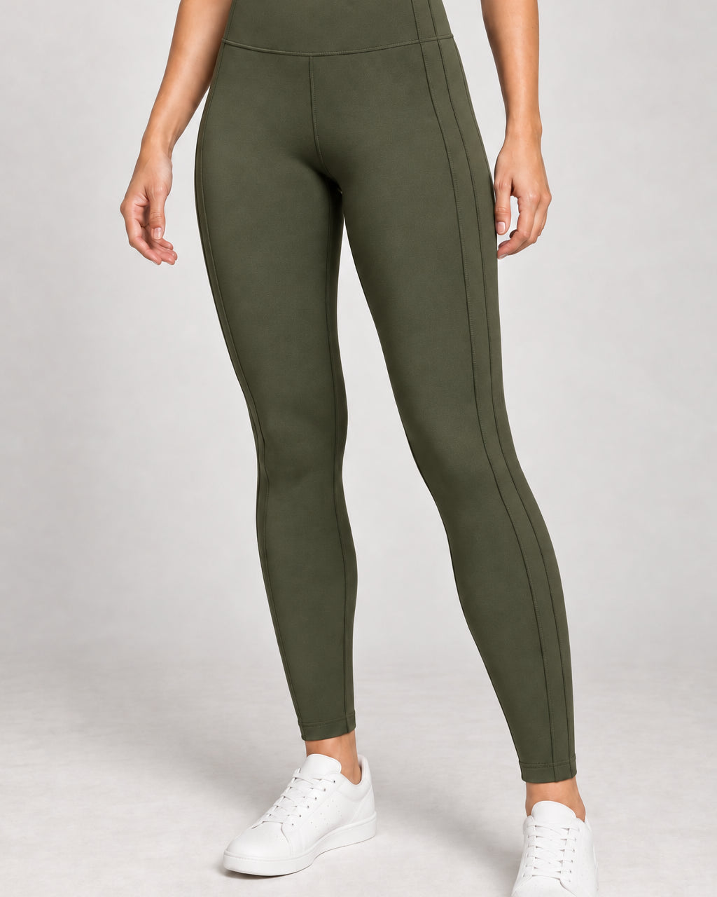 Generated concept: Akumi Contour Panel Legging 28" in Moss, front studio view