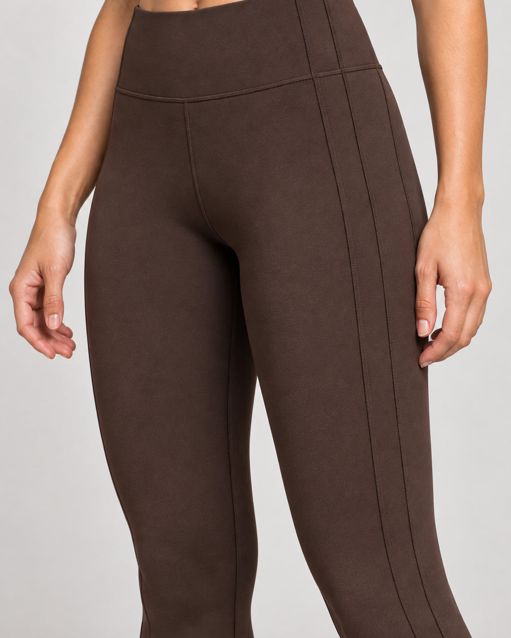 Generated concept: Akumi Contour Panel Legging 28" in Espresso, two parallel side panel seams at hip and thigh detail