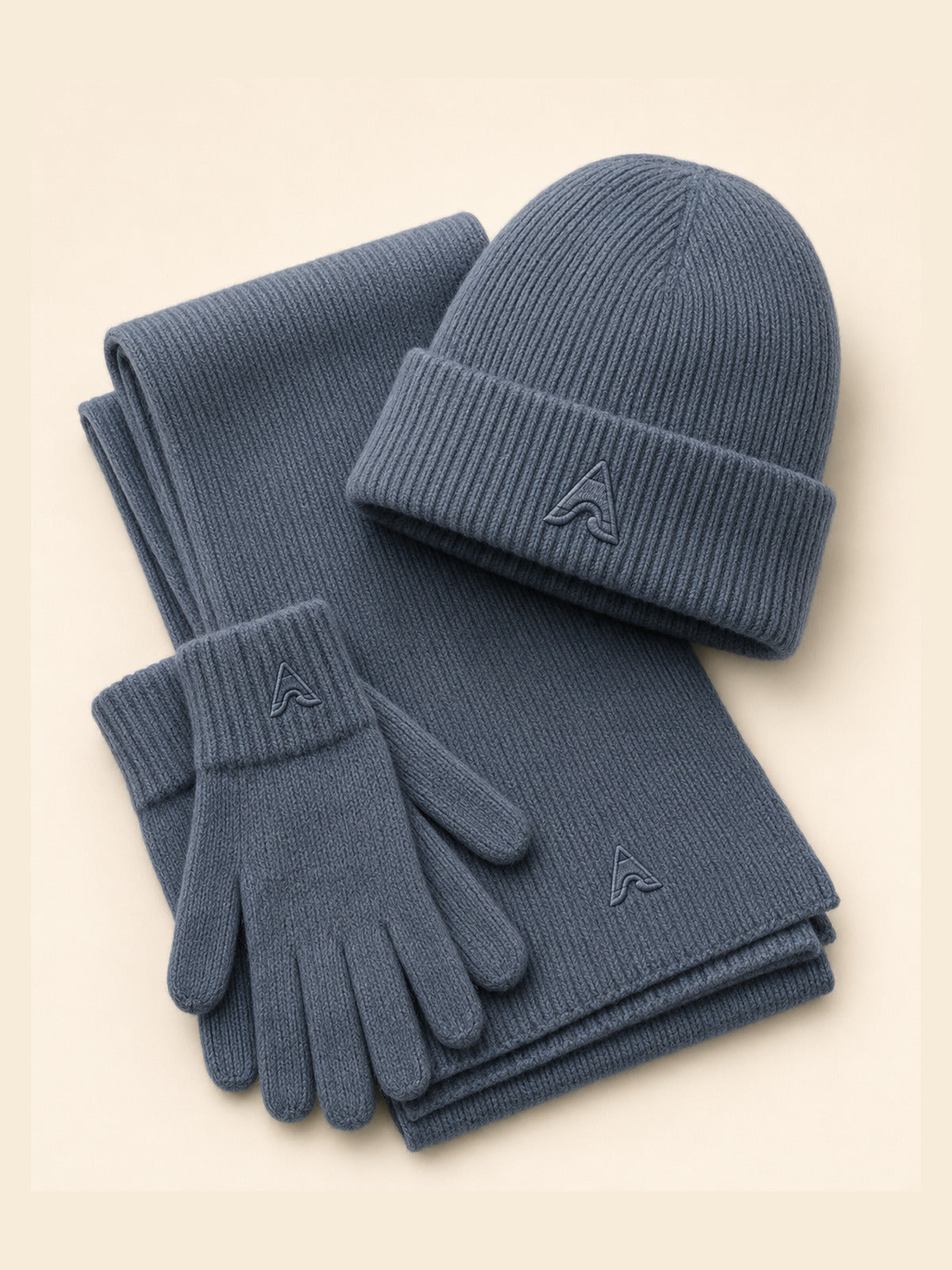 Akumi Drift Knit Winter Set in Glacier Slate flat lay with beanie scarf and gloves