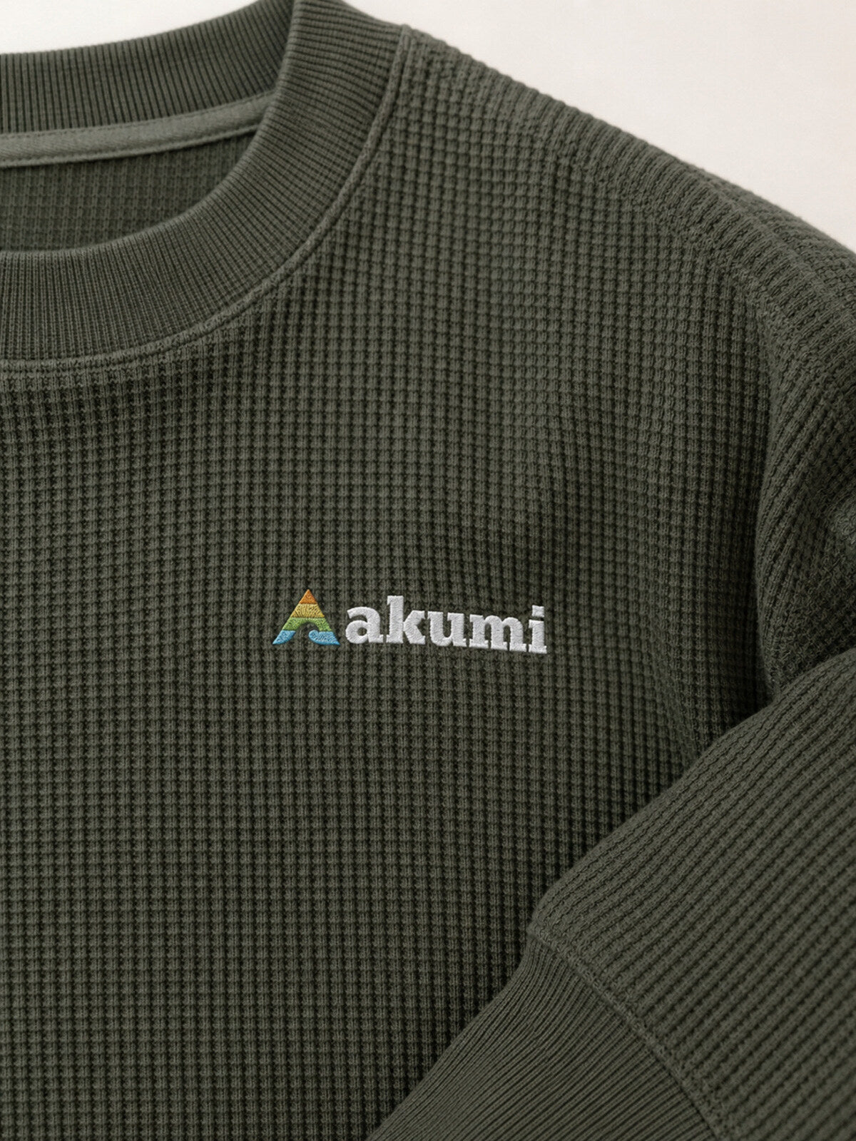 Akumi Gridsoft Waffle Long Sleeve in River Moss embroidered logo and waffle texture detail