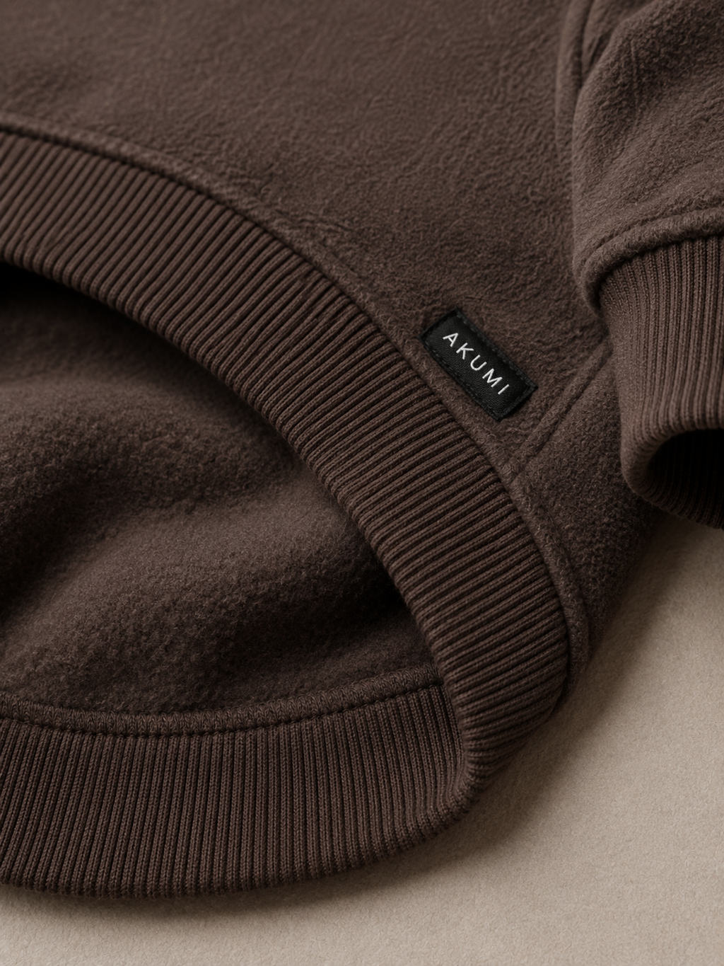Grounded Fleece Pet Hoodie fleece and Akumi label detail