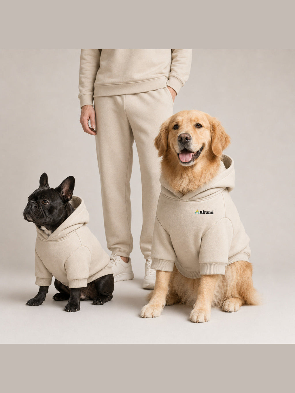 Akumi Quietline Pet Hoodie Warm Limestone corrected lifestyle styling with restrained embroidered logo