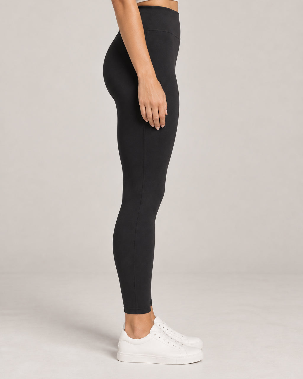 Generated concept: Akumi Still High-Rise Legging 25" in Black, side studio view