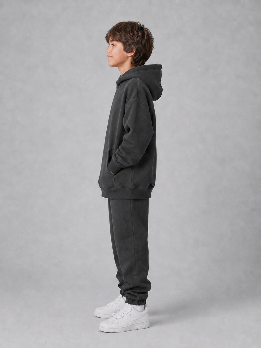 Stillform Kids Hoodie side studio view