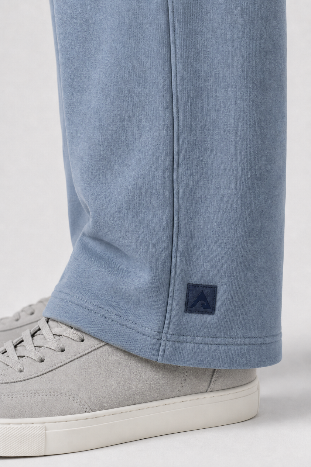 Stillform Straight Leg Sweatpants tonal Akumi logo and open hem detail