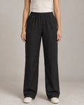 Generated design concept: Akumi Women's Coast Drawcord Woven Pant in Onyx, front studio view.
