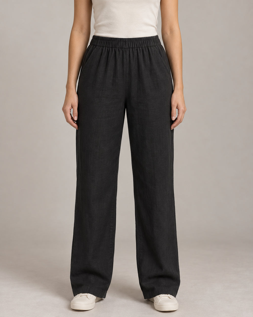 Generated design concept: Akumi Women's Coast Drawcord Woven Pant in Onyx, front studio view.